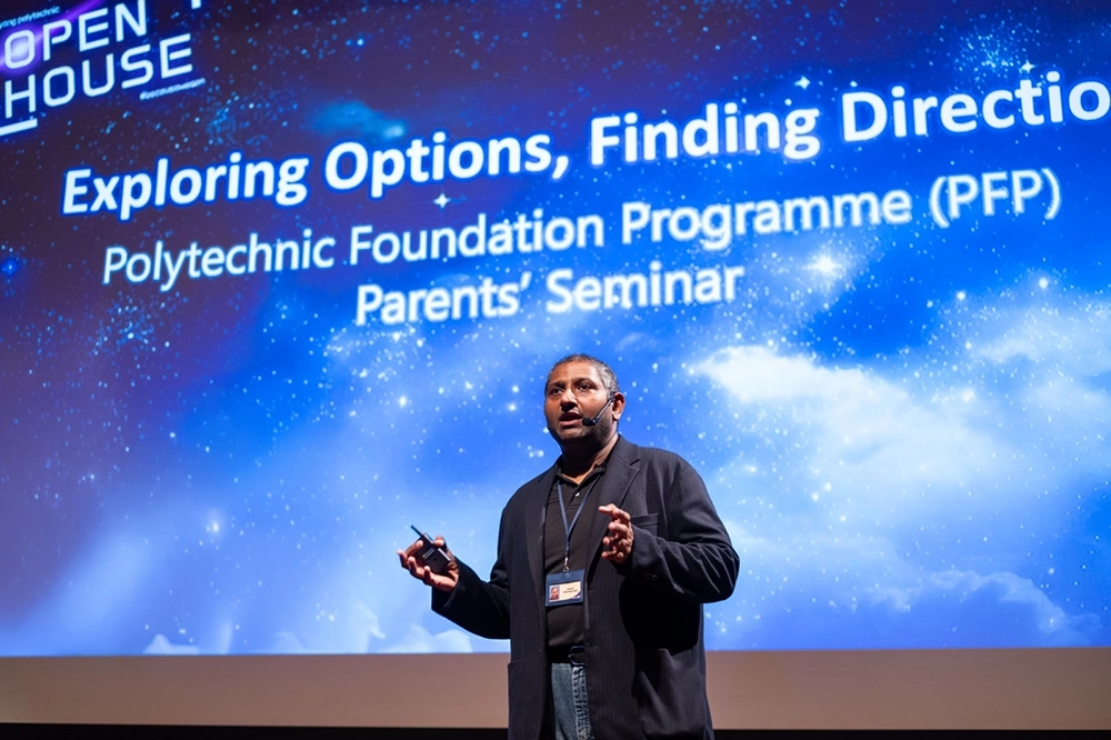 Mr Anand Krishnasamy (Director, Centre for Innovation & Life Skills) giving a presentation at NYP Open House 2025.