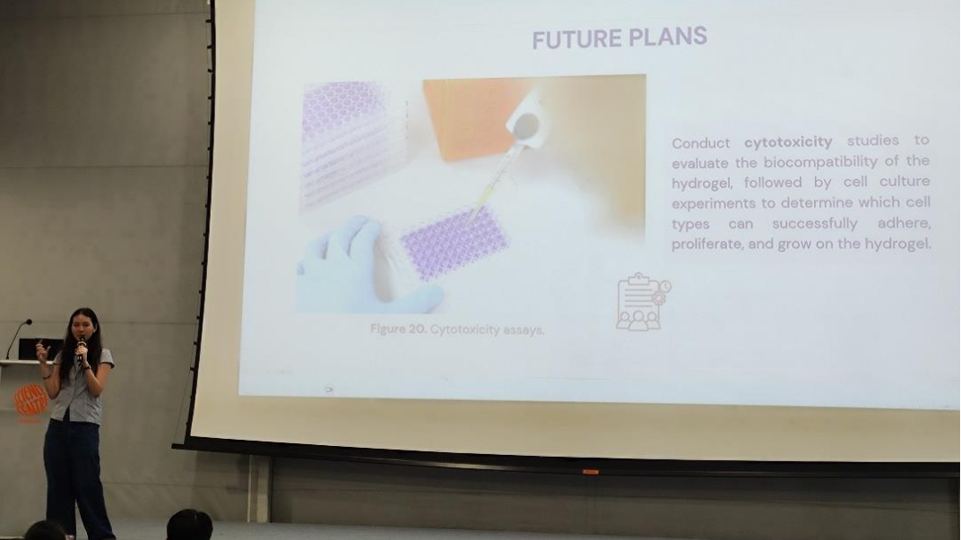 Chloee delivering a presentation on her internship research at the Young Scientist Symposium 2026.