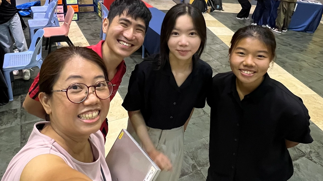 Vera Ho (second from right) with her industry supervisor, NYP internship mentor, and coursemate