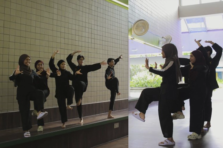 Students dancing in front of the mirrors