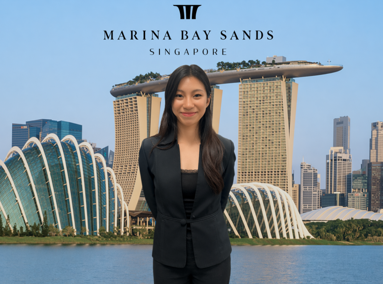 Intern standing in front of Marina Bay Sands Singapore during a MICE internship experience.