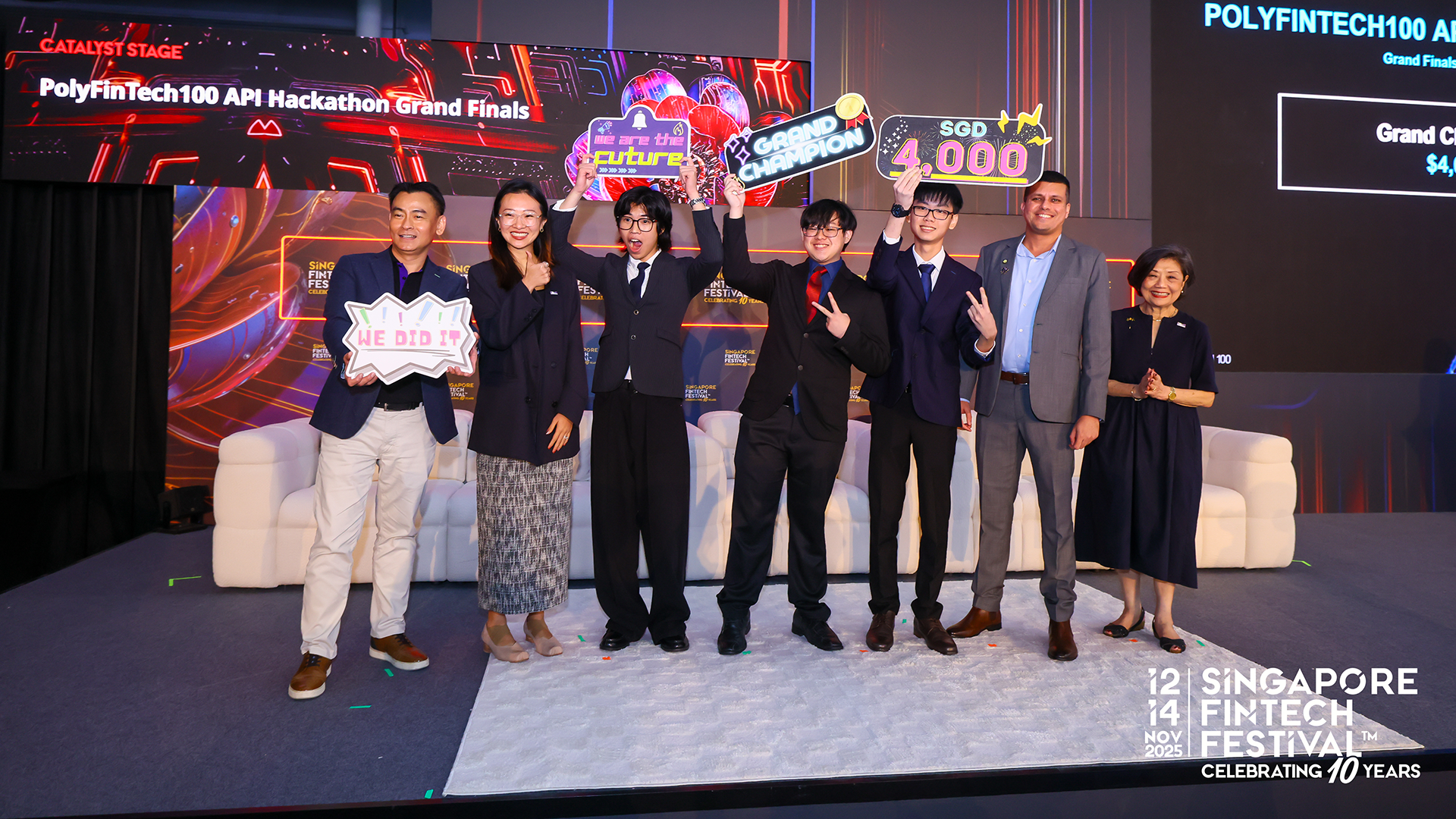 (Third from left onwards) Joseph Choo, Ang Lik Hsean, and Nathan Kosasih were crowned Grand Champion at PolyFinTech100 API Hackathon 2025, finishing first among over 200 teams across all five polytechnics. Not pictured: Theophilias Lin. 