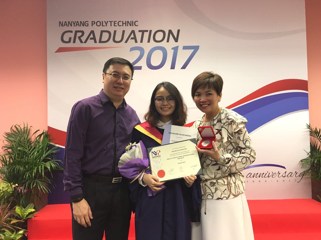 Kristine Chua with her parents.