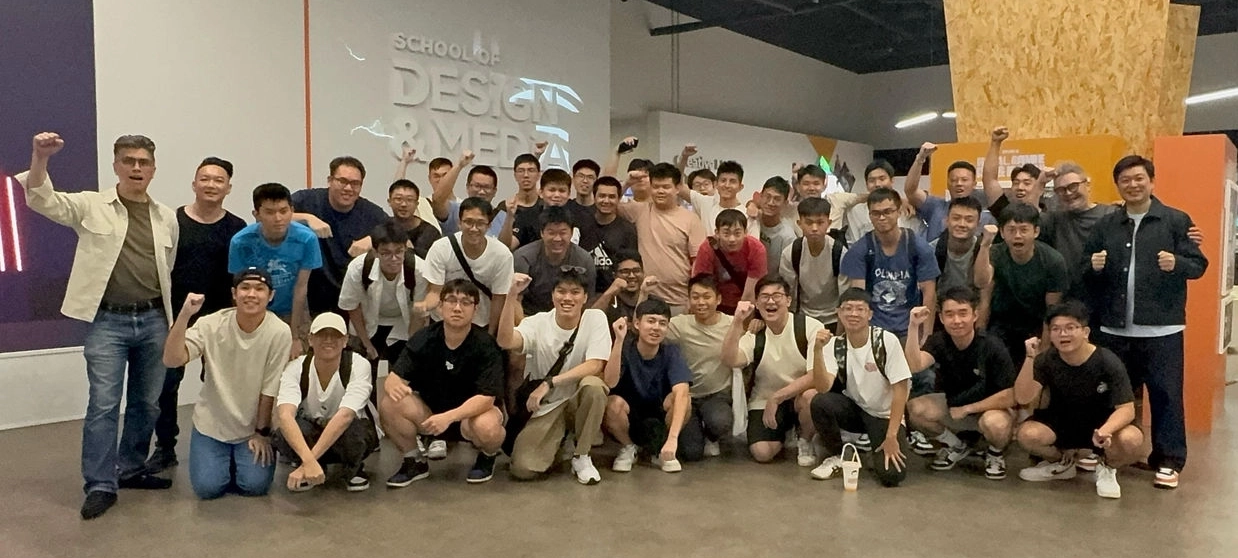 Group photo of NYP staff with Singapore National Servicemen who participated in the multimedia production for Singapore's National Day Parade.