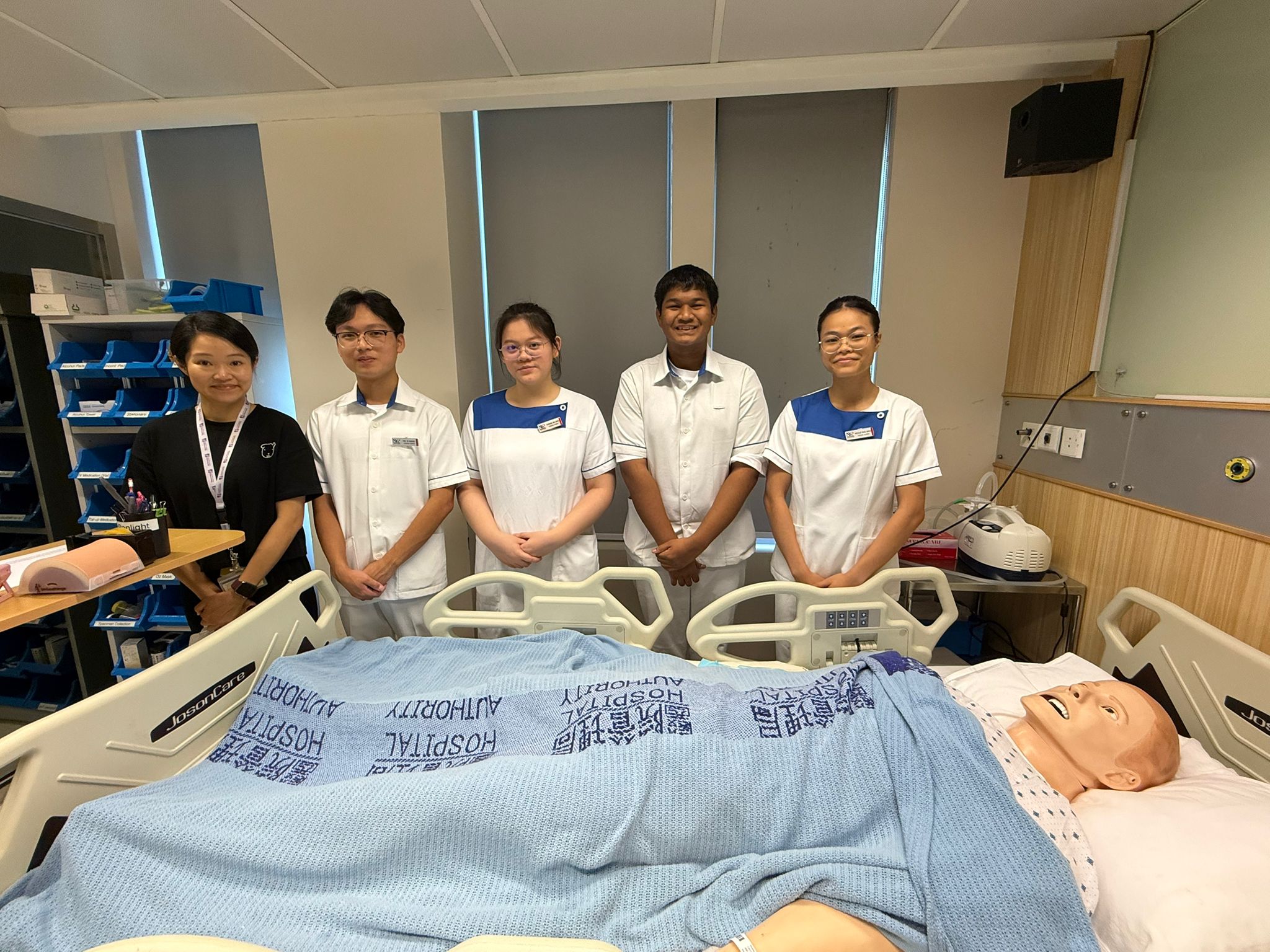 Joash Emmanuel (second from right) with fellow NYP students at a simulation-based learning session in Tung Wah College, Hong Kong.​