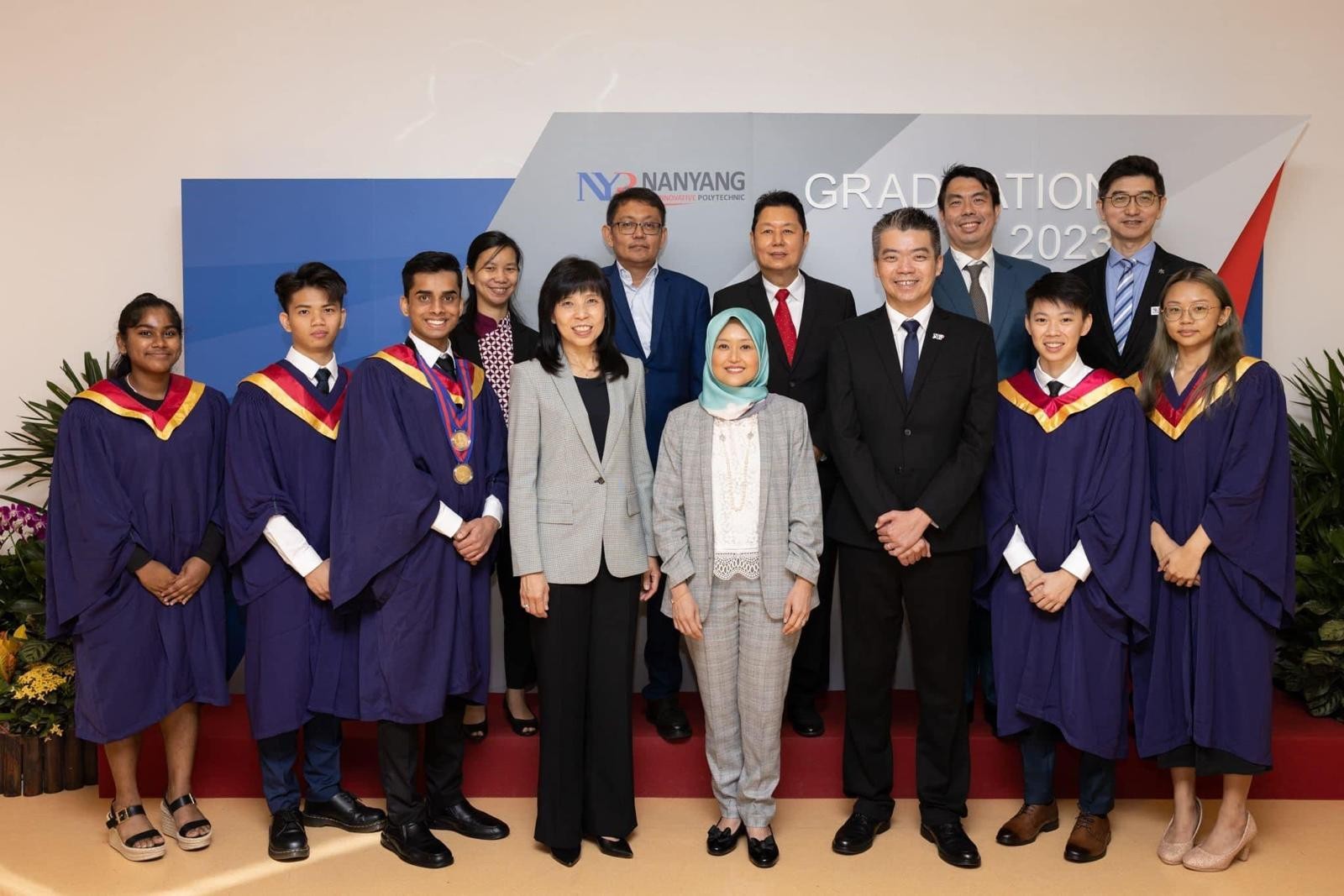 Jean (front row, second from right) on Graduation day with Minister of State Ms Rahayu Mahzam, NYP Principal & CEO Mr Russell Chan, NYP SHSS Management, and top nursing students from the Class of 2023.